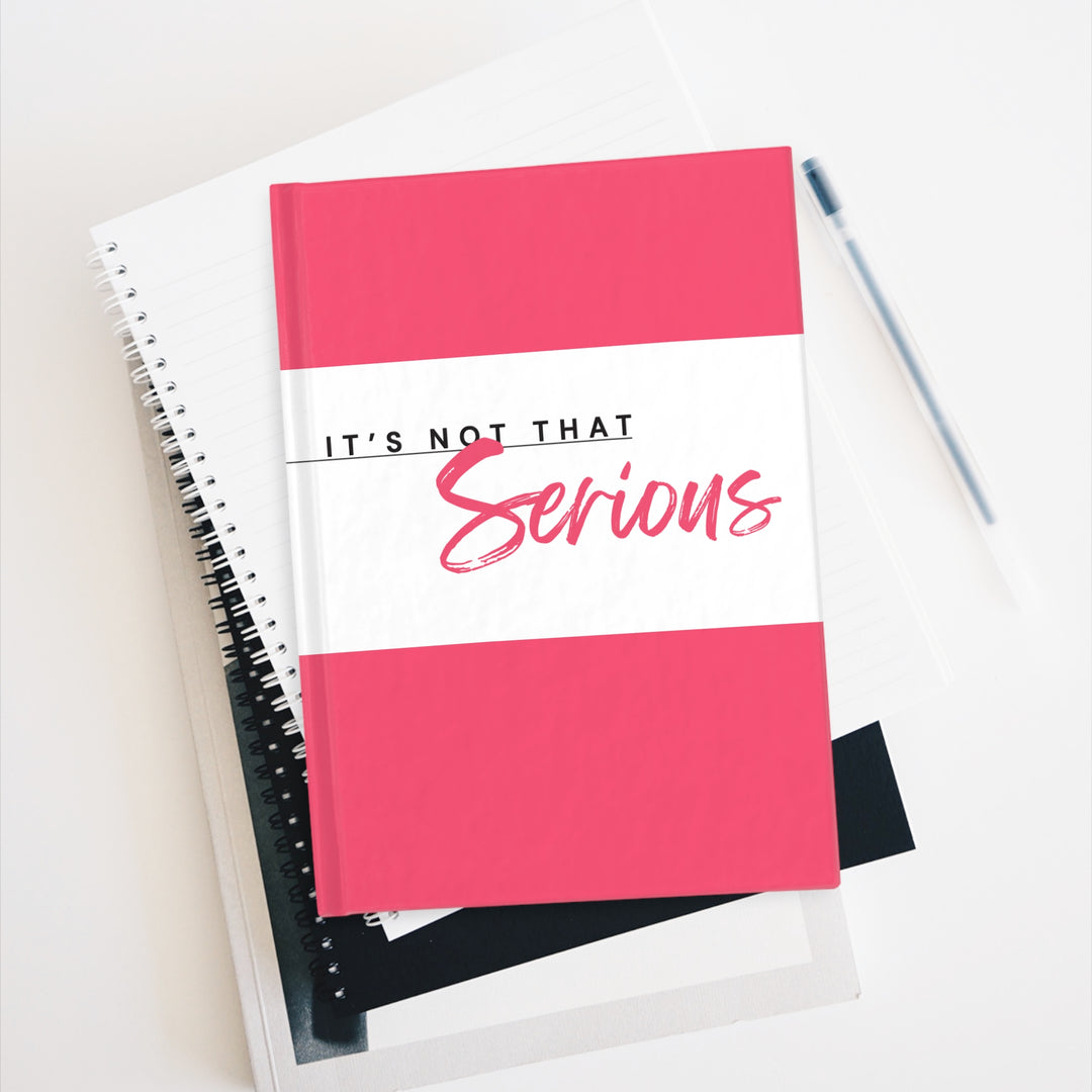 Notebook with 'It's Not That Serious' text on a white background