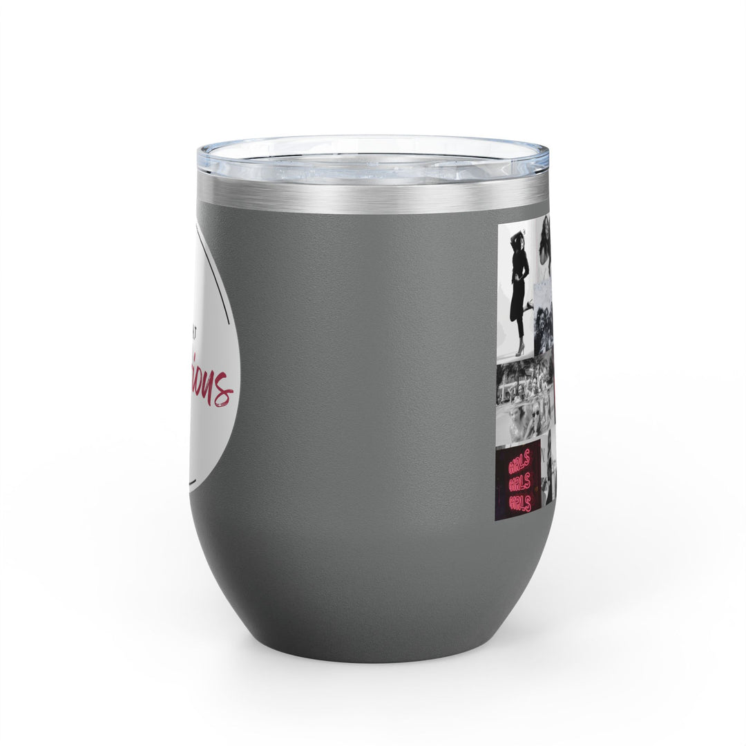 Grey tumbler with women's empowerment label on white background