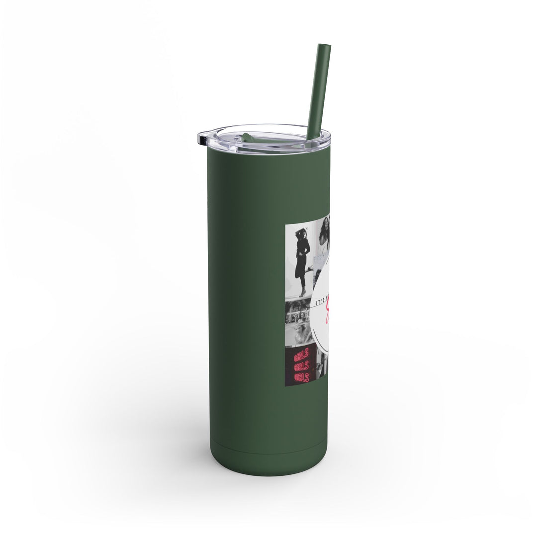 Green tumbler with a straw on a white background
