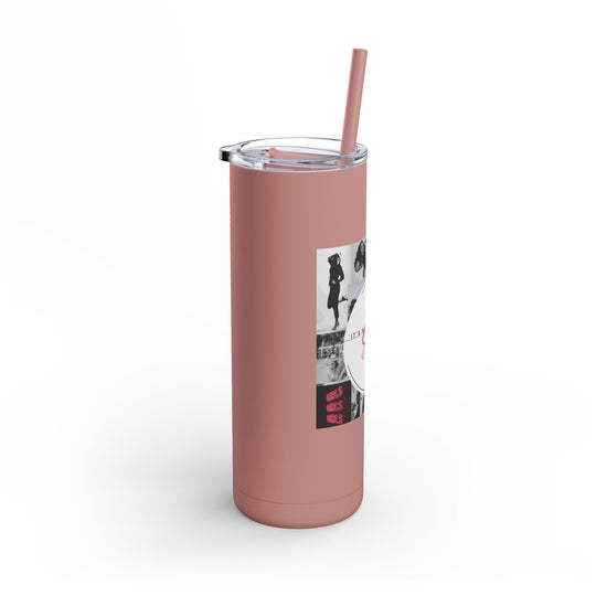 Pink tumbler with a straw on a white background