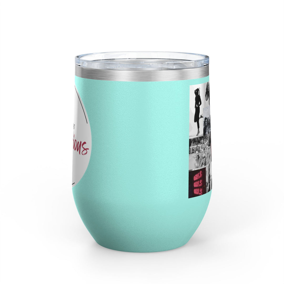 Mint green tumbler with women's empowerment label on white background
