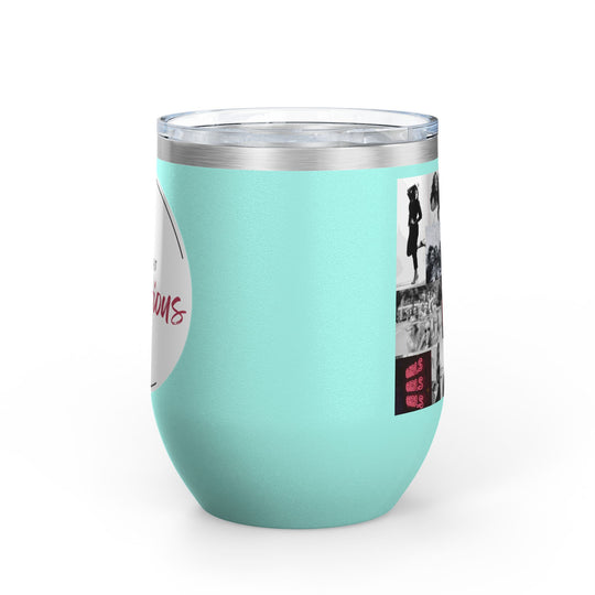 Mint green tumbler with women's empowerment label on white background