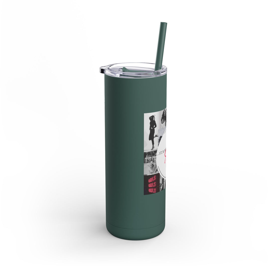 Green tumbler with a straw on a white background