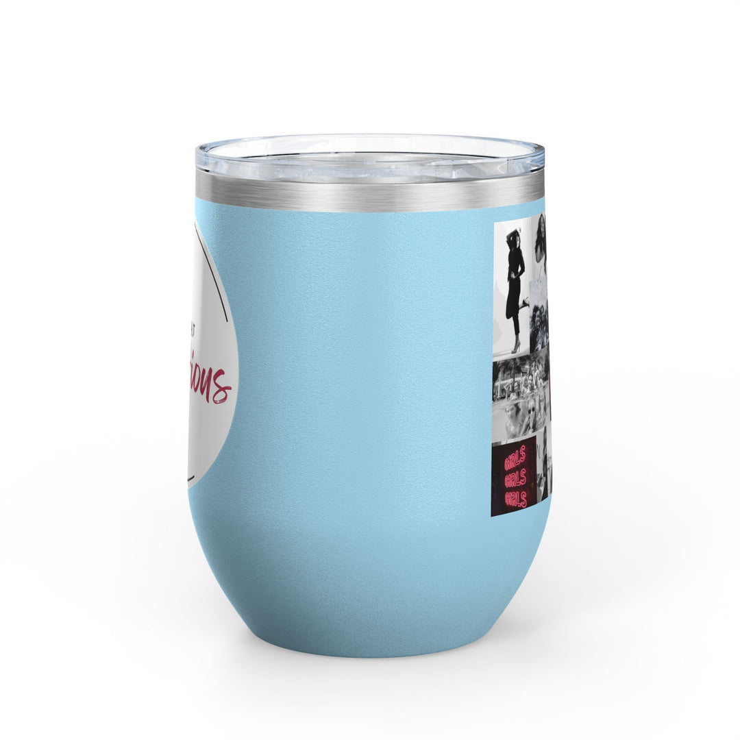 Blue tumbler with clear lid on white background