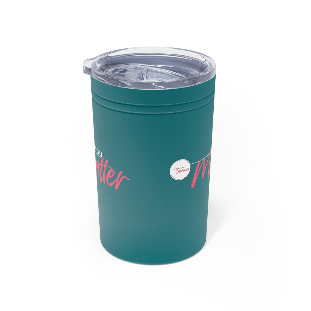 Teal tumbler with pink text and a logo on a white background