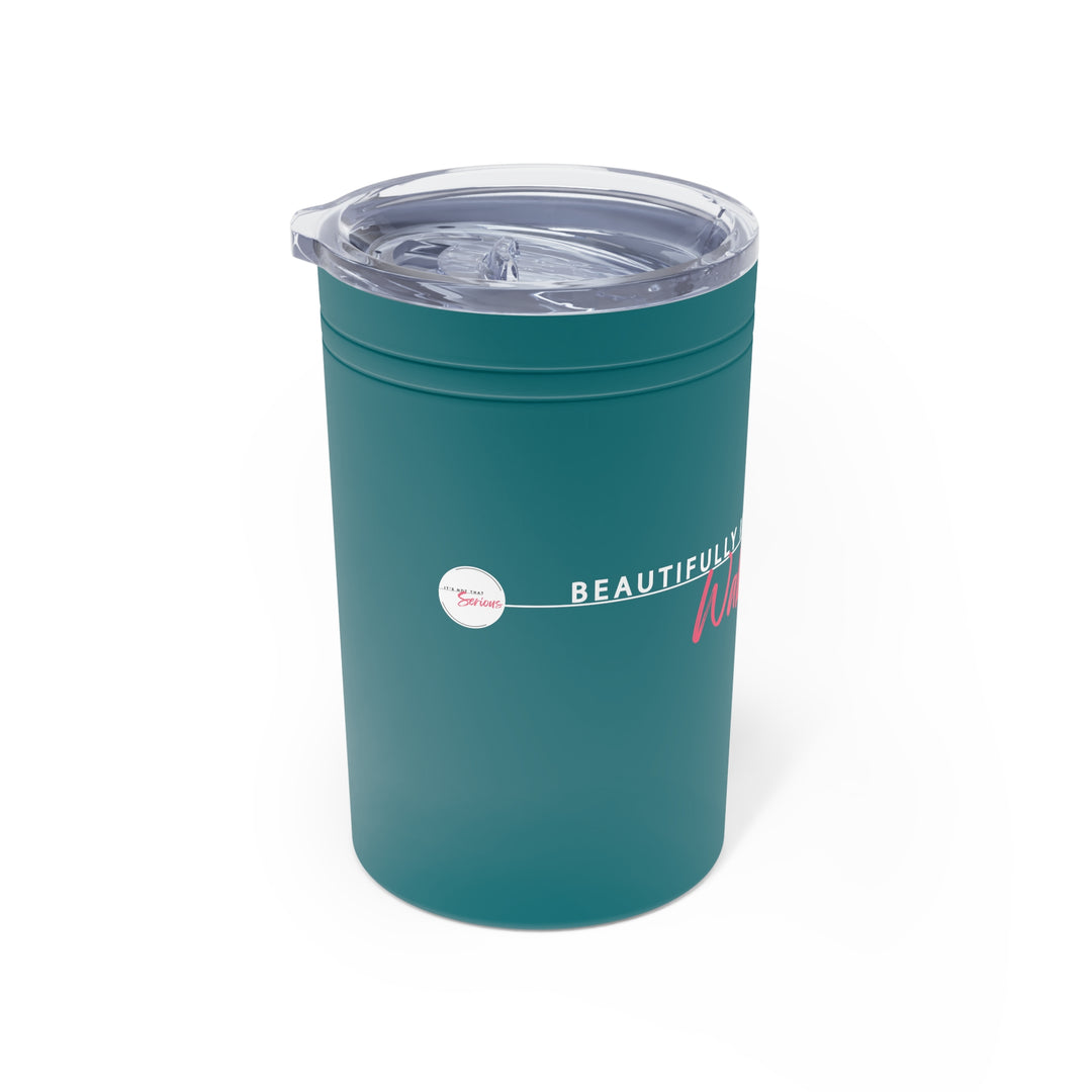 Teal tumbler with a clear lid on a white background