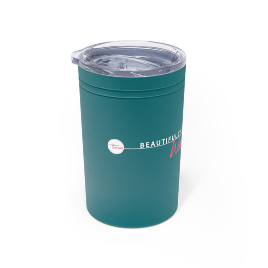Teal tumbler with a clear lid on a white background