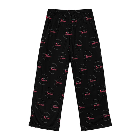 A pair of women's black pajama pants with a red and white text pattern and a drawstring waist.