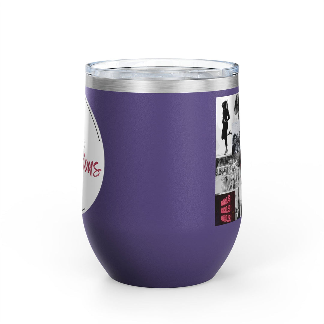 Purple tumbler with women's empowerment label on white background