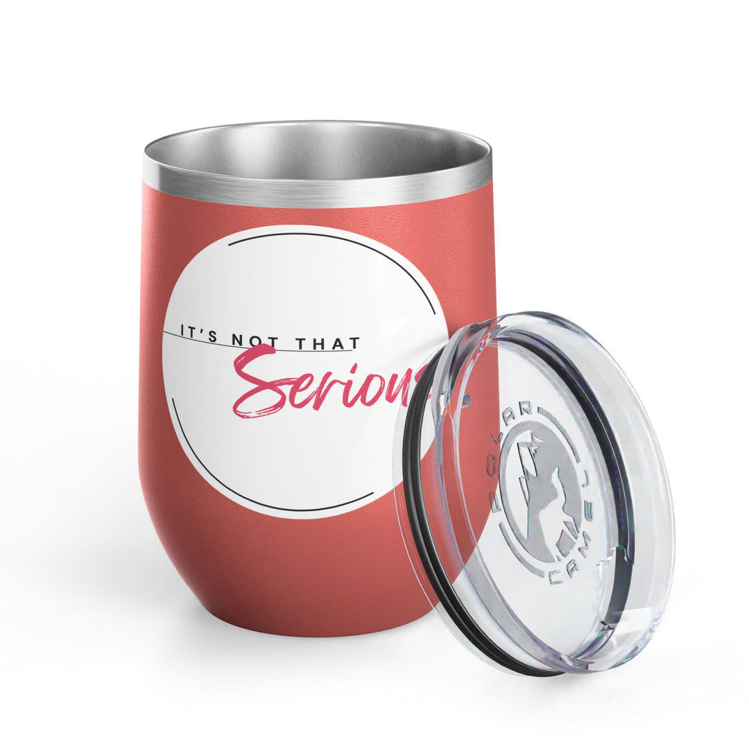 Red tumbler with clear lid on white background