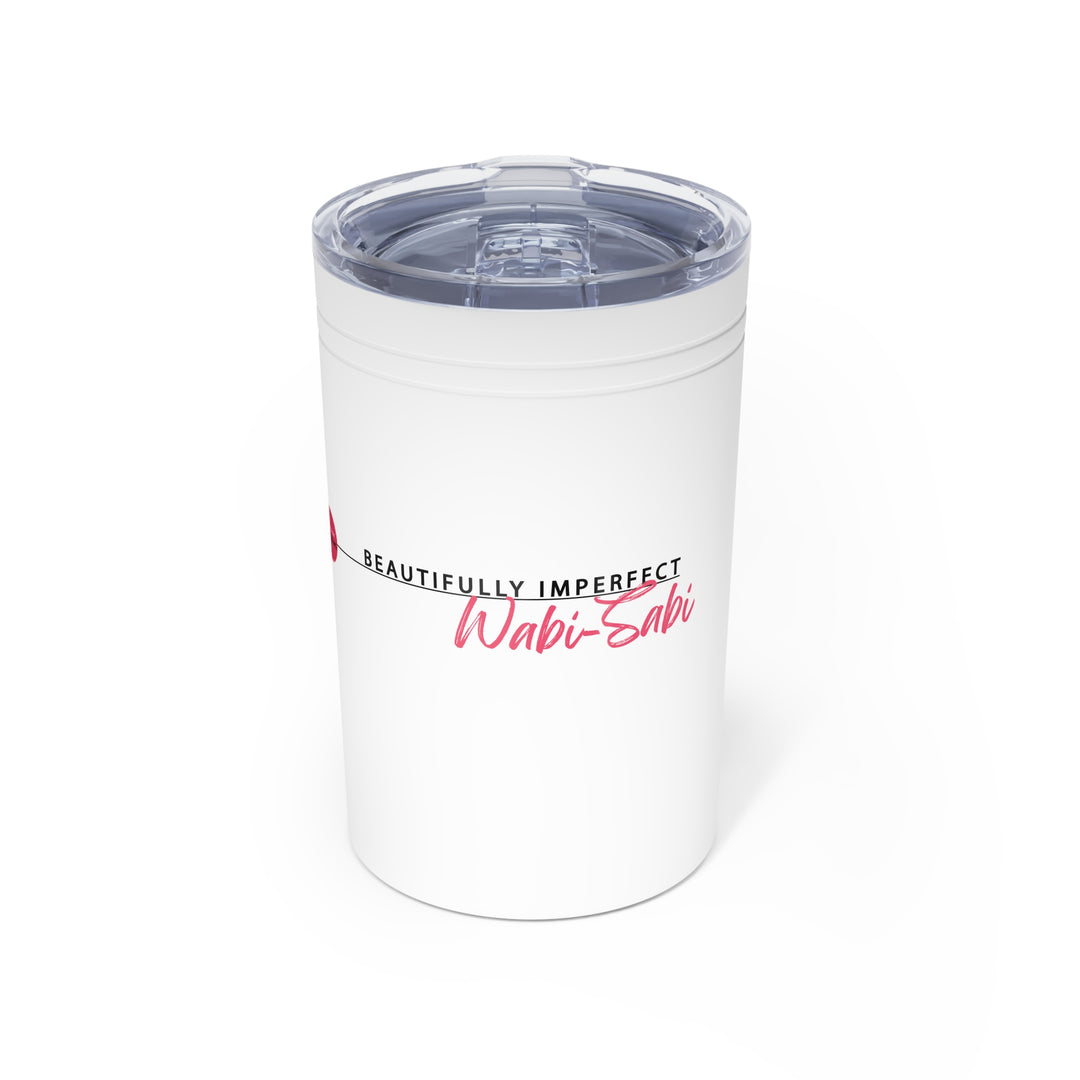White tumbler with 'Wabi-Sabi' text on a white background
