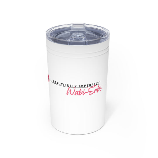 White tumbler with 'Wabi-Sabi' text on a white background