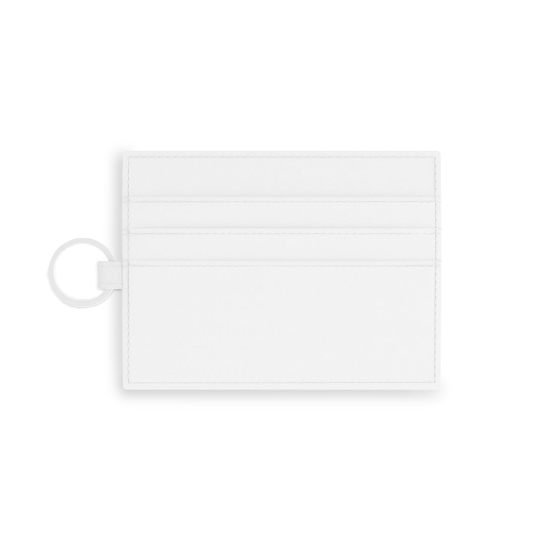 A white faux leather card holder with a red text design on one side, accompanied by a metal keyring.