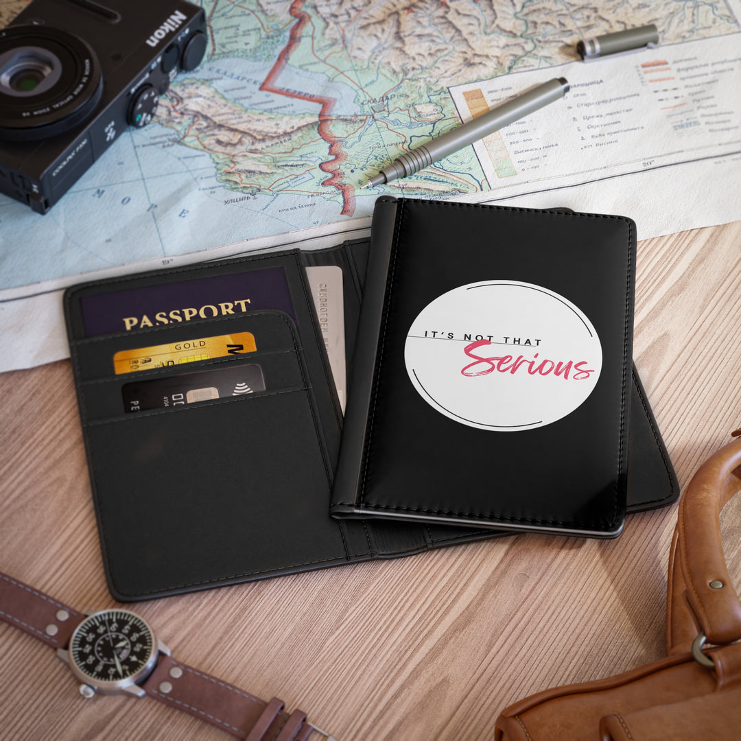 Black travel wallet with passport holder on a map background