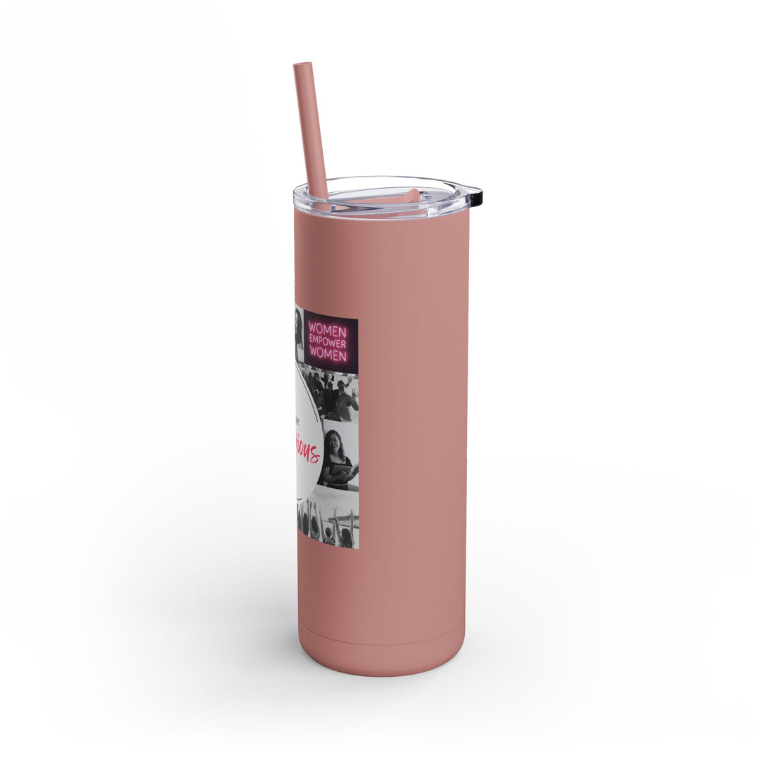 Pink tumbler with a straw on a white background