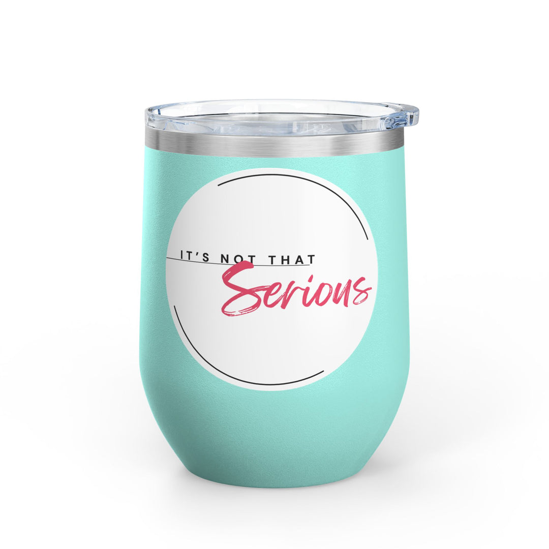 A mint green 12oz wine tumbler with a printed phrase 'It's Not That Serious' on the side