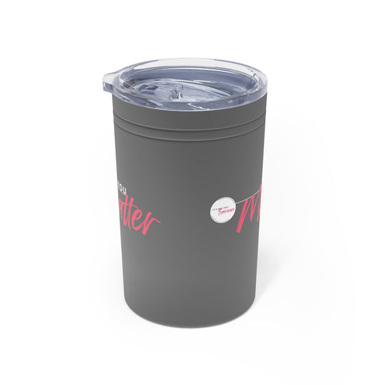 Gray tumbler with pink text on a white background