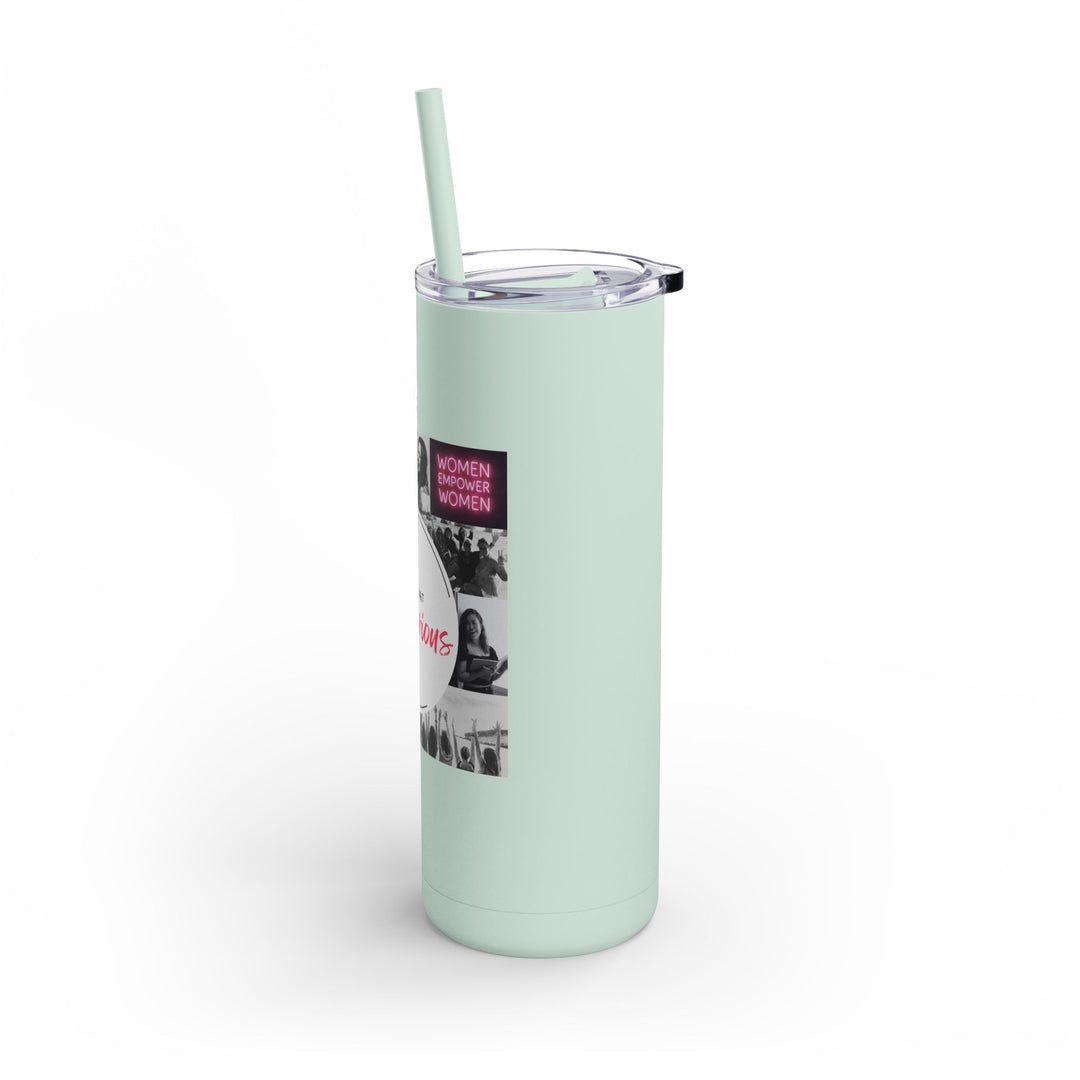 Mint green tumbler with a straw on a white background