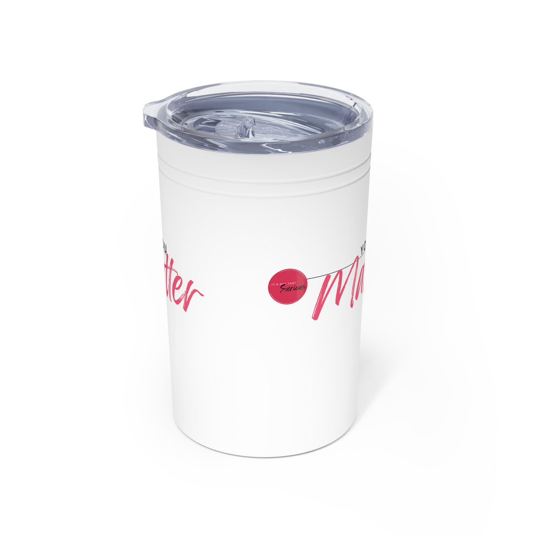 White tumbler with pink text and design on a white background