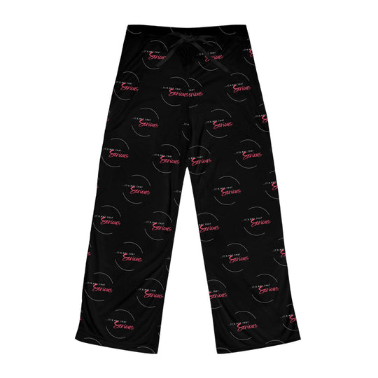 A pair of women's black pajama pants with a red and white text pattern and a drawstring waist.
