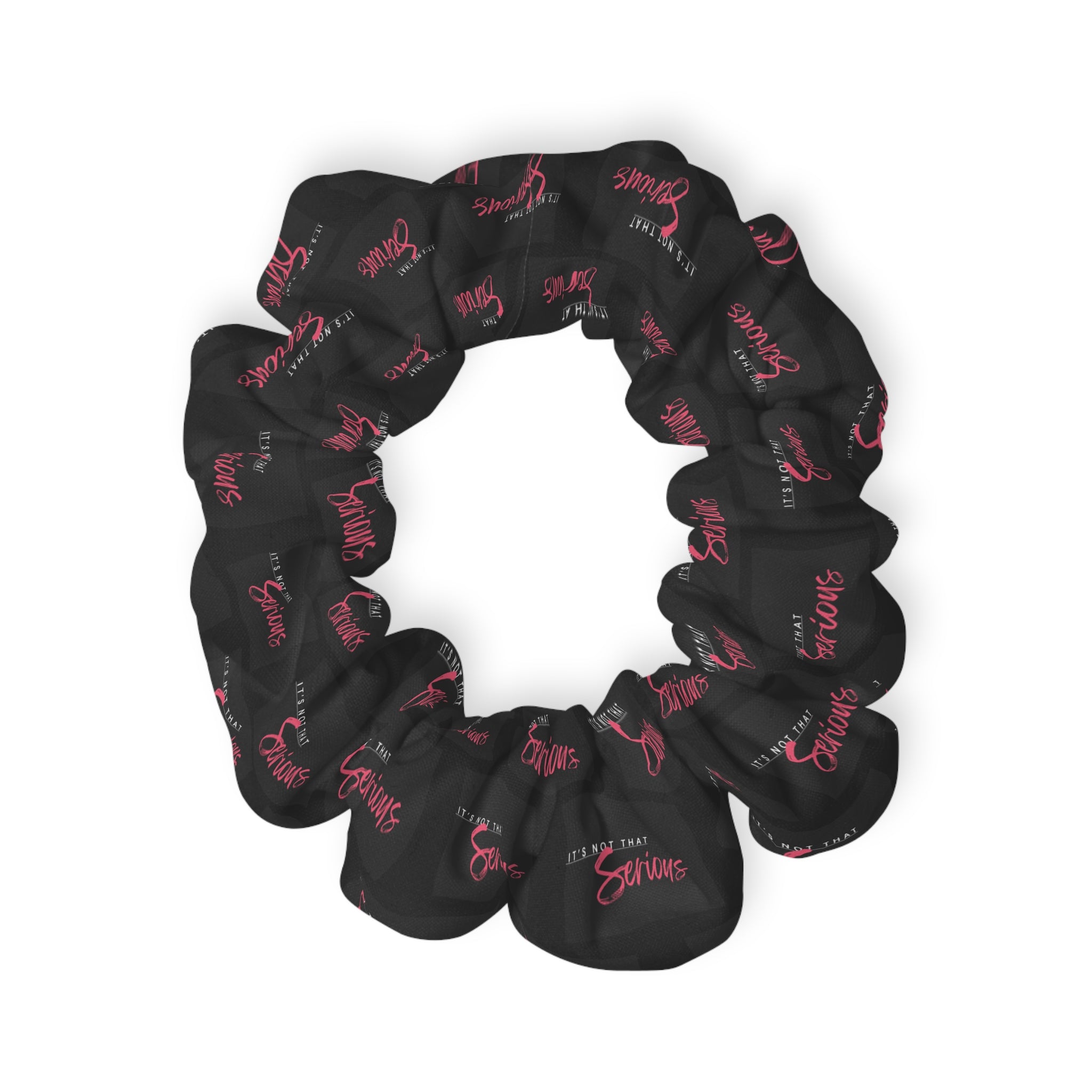 A black scrunchie with pink text all-over print, on a white background.