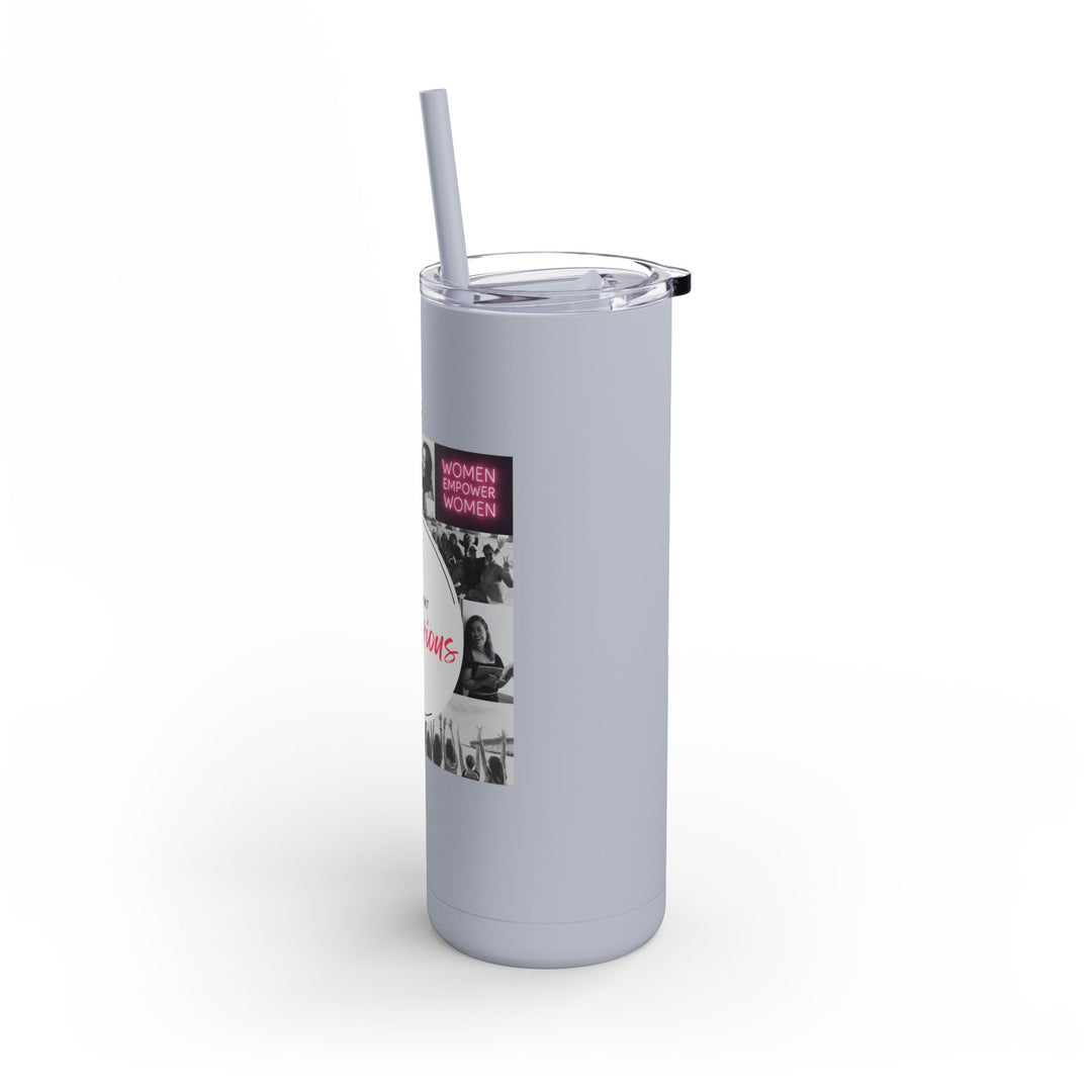 Gray tumbler with a straw featuring a graphic design on a white background
