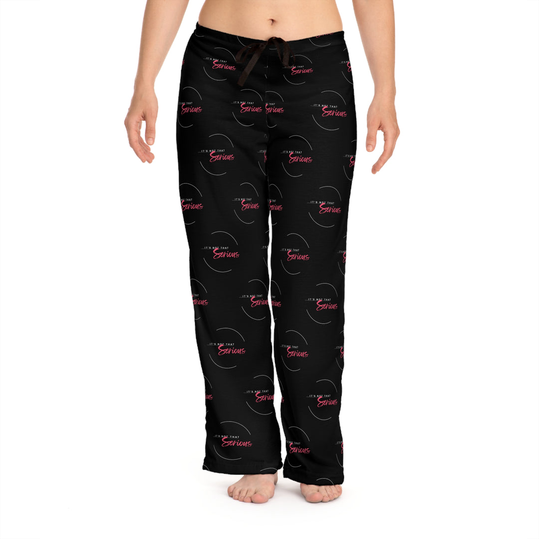 A pair of women's black pajama pants with a red and white text pattern and a drawstring waist.