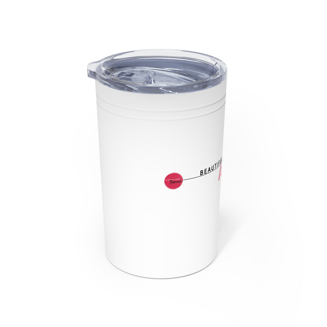 White tumbler with a clear lid on a white background