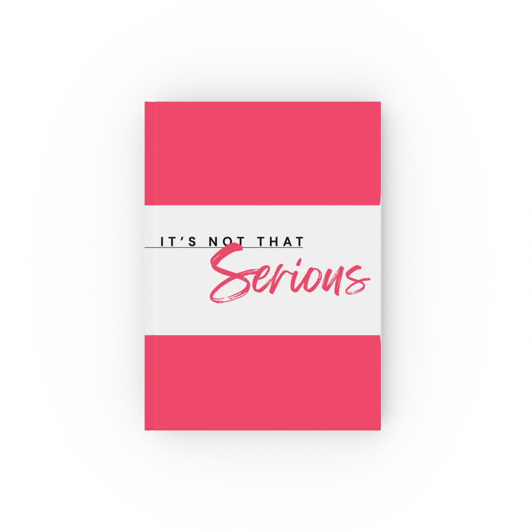 A hard backed journal with vibrant pink and white print on the cover, titled 'It's Not That Serious', 