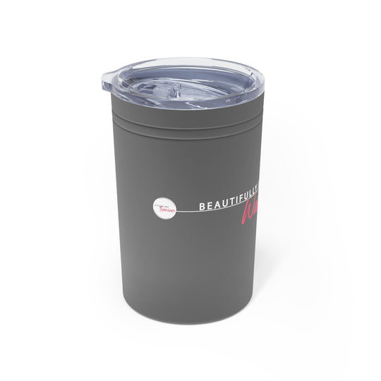 Gray tumbler with a clear lid on a white background