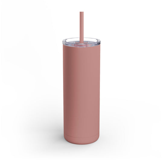 Pink tumbler with a straw on a white background