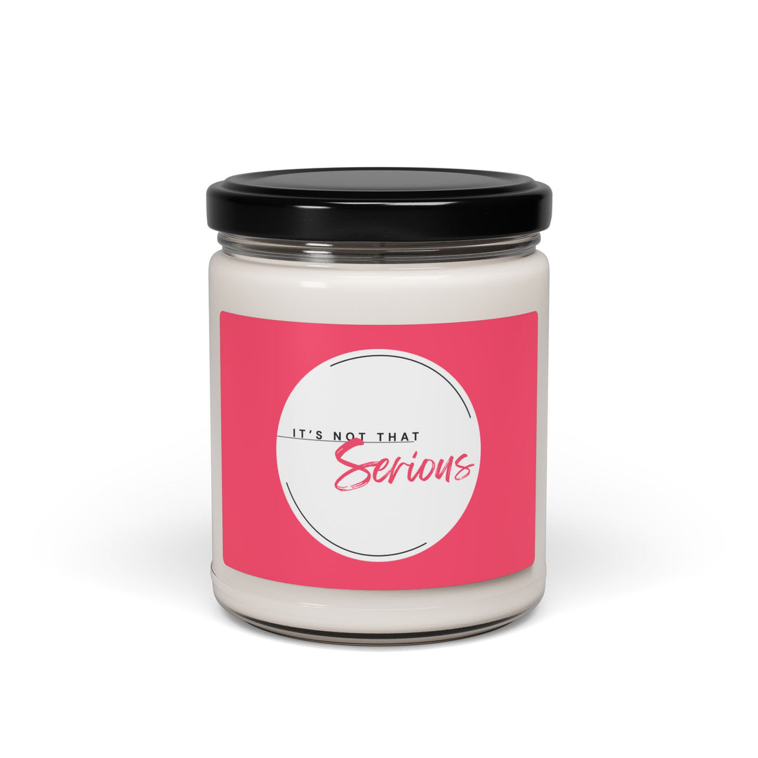 Candle jar with a pink label and black lid on a white background